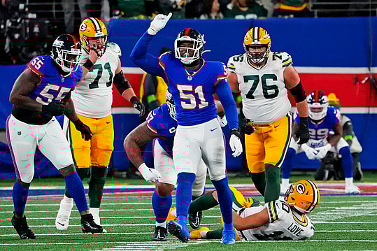 Dec 11, 2023; East Rutherford, New Jersey, USA; New York Giants linebacker Azeez Ojulari (51) celebrates after making a sack on Green Bay Packers quarterback Jordan Love (10) during the fourth quarter at MetLife Stadium. Mandatory Credit: Robert Deutsch-USA TODAY Sports