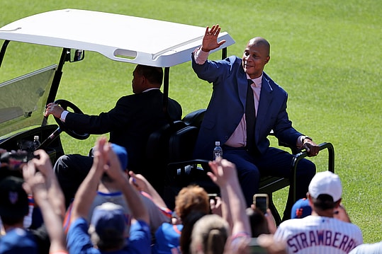 Jun 1, 2024; New York City, New York, USA; New York Mets former player Darryl Strawberry waves to fans from the back of a golf cart after his number 18 was retired in a ceremony before a game against the Arizona Diamondbacks at Citi Field. Mandatory Credit: Brad Penner-USA TODAY Sports