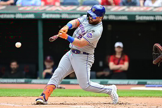 May 22, 2024; Cleveland, Ohio, USA; New York Mets right fielder DJ Stewart (29) hits a single during the first inning against the Cleveland Guardians at Progressive Field. Mandatory Credit: Ken Blaze-USA TODAY Sports