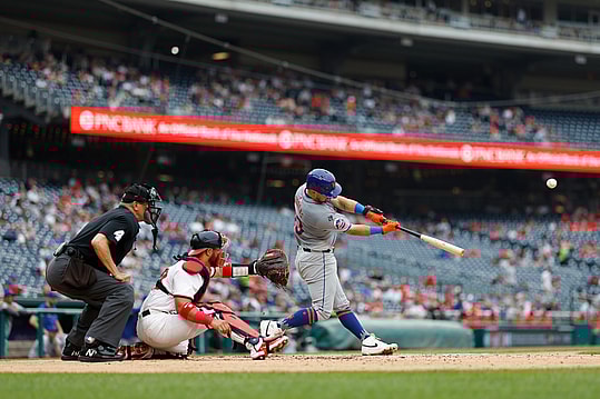 Jun 5, 2024; Washington, District of Columbia, USA; New York Mets catcher Luis Torrens (13) hits a solo home run against the Washington Nationals during the third inning at Nationals Park. Mandatory Credit: Geoff Burke-USA TODAY Sports