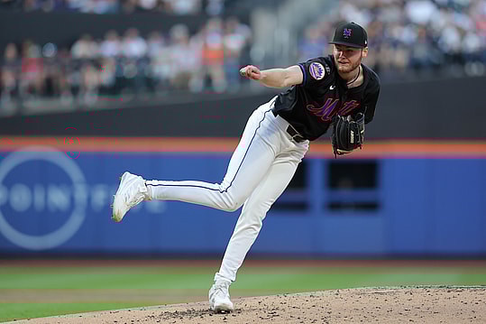 May 24, 2024; New York City, New York, USA; New York Mets starting pitcher Christian Scott (45) follows through on a pitch against the San Francisco Giants during the second inning at Citi Field. Mandatory Credit: Brad Penner-USA TODAY Sports