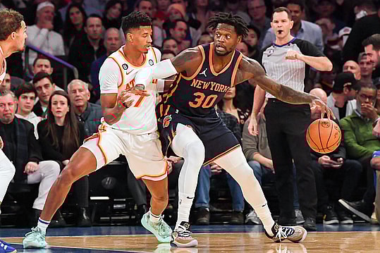 Dec 7, 2022; New York, New York, USA; New York Knicks forward Julius Randle (30) dribbles the ball defended by Atlanta Hawks guard Jarrett Culver (7) during the first quarter at Madison Square Garden. Mandatory Credit: Dennis Schneidler-USA TODAY Sports