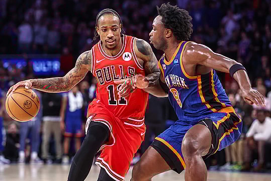 Apr 14, 2024; New York, New York, USA; Chicago Bulls forward DeMar DeRozan (11) looks to drive past New York Knicks forward OG Anunoby (8) in the fourth quarter at Madison Square Garden. Mandatory Credit: Wendell Cruz-USA TODAY Sports