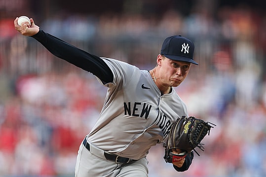 Jul 30, 2024; Philadelphia, Pennsylvania, USA; New York Yankees starting pitcher Will Warren (98) throws a pitch during the second inning against the Philadelphia Phillies at Citizens Bank Park. Mandatory Credit: Bill Streicher-USA TODAY Sports