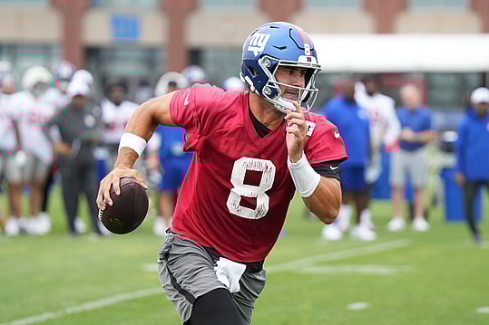 Jul 25, 2024; East Rutherford, NY, USA; New York Giants quarterback Daniel Jones (8) scrambles during training camp at Quest Diagnostics Training Center. Mandatory Credit: Lucas Boland-USA TODAY Sports
