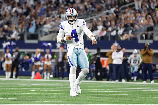 Nov 12, 2023; Arlington, Texas, USA; Dallas Cowboys quarterback Dak Prescott (4) reacts after throwing a touchdown pass in the second quarter against the New York Giants at AT&T Stadium. Mandatory Credit: Tim Heitman-USA TODAY Sports
