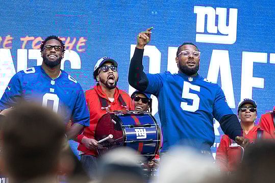 Apr 25, 2024; East Rutherford, NJ, USA; (Left) NY Giants #0 Brian Burns and #5 Kayvon Thibodeaux during the NY Giants and NY Jets draft party at MetLife Stadium.