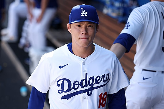 Sep 22, 2024; Los Angeles, California, USA; Los Angeles Dodgers starting pitcher Yoshinobu Yamamoto (18) walks in the dugout during the third inning against the Colorado Rockies at Dodger Stadium. Mandatory Credit: Kiyoshi Mio-Imagn Images
