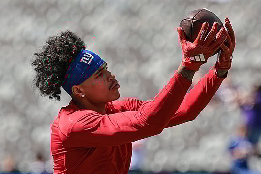 Sep 8, 2024; East Rutherford, New Jersey, USA; New York Giants wide receiver Jalin Hyatt (13) warms up before the game against the Minnesota Vikings at MetLife Stadium. Mandatory Credit: Vincent Carchietta-Imagn Images