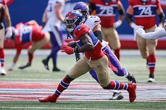 Sep 8, 2024; East Rutherford, New Jersey, USA; New York Giants wide receiver Malik Nabers (1) gains yards after catch during the first half against the Minnesota Vikings at MetLife Stadium. Mandatory Credit: Vincent Carchietta-Imagn Images
