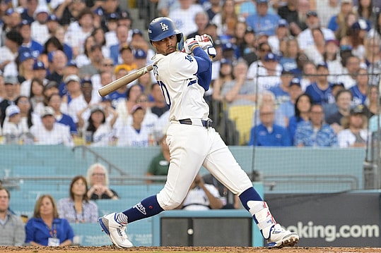 Oct 6, 2024; Los Angeles, California, USA; Los Angeles Dodgers shortstop Mookie Betts (50) strikes out in the fourth inning against the San Diego Padres during game two of the NLDS for the 2024 MLB Playoffs at Dodger Stadium. Mandatory Credit: Jayne Kamin-Oncea-Imagn Images