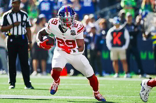 Oct 6, 2024; Seattle, Washington, USA; New York Giants running back Tyrone Tracy Jr. (29) rushes against the Seattle Seahawks during the first quarter at Lumen Field. Mandatory Credit: Joe Nicholson-Imagn Images