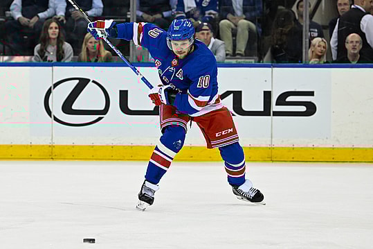 May 30, 2024; New York, New York, USA; New York Rangers left wing Artemi Panarin (10) lines up a shot against the Florida Panthers during the first period in game five of the Eastern Conference Final of the 2024 Stanley Cup Playoffs at Madison Square Garden. Mandatory Credit: Dennis Schneidler-Imagn Images