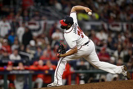 Oct 12, 2022; Atlanta, Georgia, USA; Atlanta Braves relief pitcher Kenley Jansen (74) throws against the Philadelphia Phillies in the ninth inning during game two of the NLDS for the 2022 MLB Playoffs at Truist Park. Mandatory Credit: Brett Davis-Imagn Images