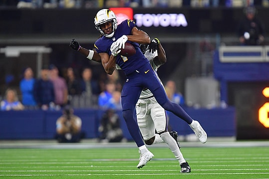 Nov 25, 2024; Inglewood, California, USA; Los Angeles Chargers wide receiver Quentin Johnston (1) catches a pass against the Baltimore Ravens during the second half at SoFi Stadium. Mandatory Credit: Gary A. Vasquez-Imagn Images