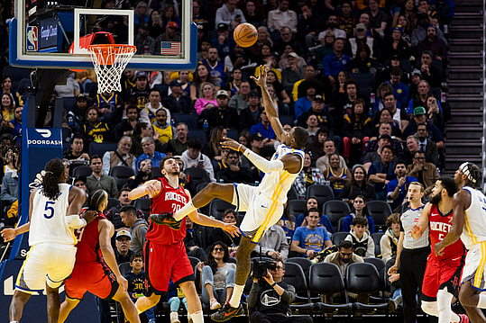 Dec 5, 2024; San Francisco, California, USA;  Golden State Warriors forward Jonathan Kuminga (00) shoots over Houston Rockets center Alperen Sengun (28) during the third quarter at Chase Center. Mandatory Credit: John Hefti-Imagn Images