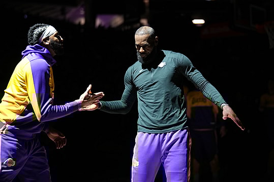 Dec 19, 2024; Sacramento, California, USA; Los Angeles Lakers forward LeBron James (23) meets with forward Anthony Davis (3) before the start of the game against the Sacramento Kings at the Golden 1 Center. Mandatory Credit: Cary Edmondson-Imagn Images