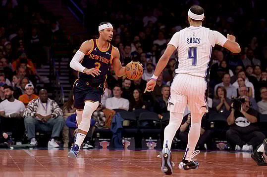 Dec 3, 2024; New York, New York, USA; New York Knicks guard Josh Hart (3) brings the ball up court against Orlando Magic guard Jalen Suggs (4) during the third quarter at Madison Square Garden. Mandatory Credit: Brad Penner-Imagn Images