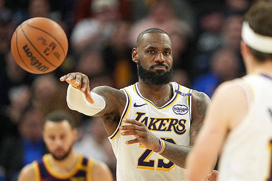 Jan 25, 2025; San Francisco, California, USA; Los Angeles Lakers forward LeBron James (23) passes against the Golden State Warriors during the fourth quarter at Chase Center. Mandatory Credit: Darren Yamashita-Imagn Images