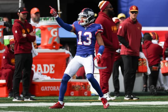 Oct 22, 2023; East Rutherford, New Jersey, USA; New York Giants wide receiver Jalin Hyatt (13) reacts after a first down catch during the first half against the Washington Commanders at MetLife Stadium. Mandatory Credit: Vincent Carchietta-USA TODAY Sports