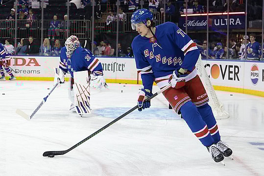May 24, 2024; New York, New York, USA; New York Rangers center Matt Rempe (73) warms up before a game against the in front of goaltender Igor Shesterkin (31) before game two of the Eastern Conference Final of the 2024 Stanley Cup Playoffs against the Florida Panthers at Madison Square Garden. Mandatory Credit: Vincent Carchietta-USA TODAY Sports