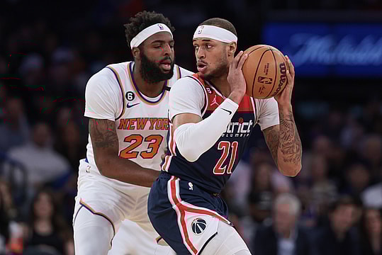 Apr 2, 2023; New York, New York, USA; Washington Wizards center Daniel Gafford (21) is guarded by New York Knicks center Mitchell Robinson (23) during the first quarter at Madison Square Garden. Mandatory Credit: Vincent Carchietta-USA TODAY Sports