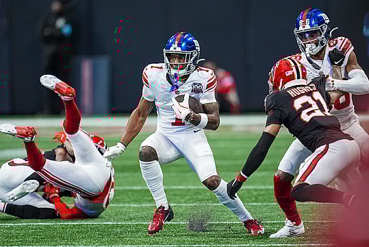 Dec 22, 2024; Atlanta, Georgia, USA; New York Giants wide receiver Malik Nabers (1) runs after a catch against the Atlanta Falcons during the first half at Mercedes-Benz Stadium. Mandatory Credit: Dale Zanine-Imagn Images