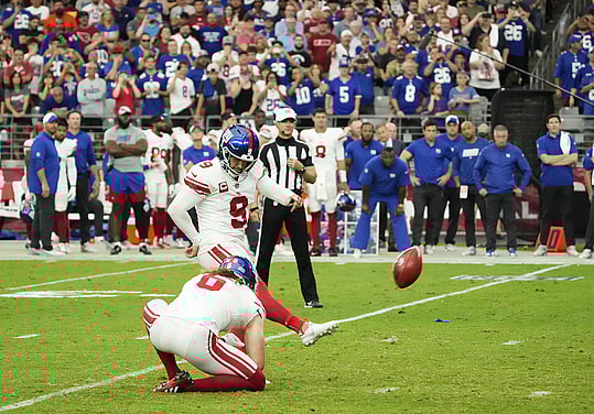 New York Giants place kicker Graham Gano (9) kicks the game winning field goal against the Arizona Cardinals in the second half at State Farm Stadium