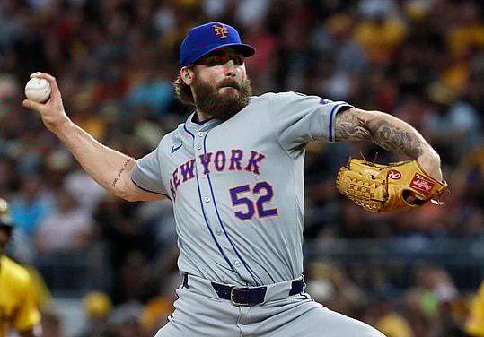 Jul 5, 2024; Pittsburgh, Pennsylvania, USA;  New York Mets pitcher Ty Adcock (52) pitches against the Pittsburgh Pirates during the seventh inning at PNC Park. Mandatory Credit: Charles LeClaire-USA TODAY Sports