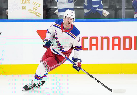Oct 19, 2024; Toronto, Ontario, CAN; New York Rangers left wing Alexis Lafreniere (13) skates during the warmup before a game against the Toronto Maple Leafs at Scotiabank Arena. Mandatory Credit: Nick Turchiaro-Imagn Images