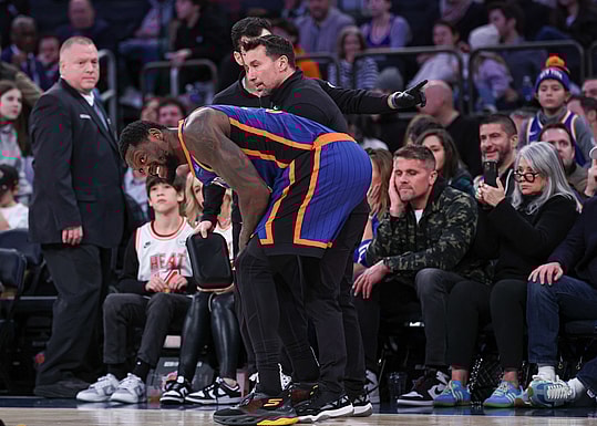 New York Knicks forward Julius Randle (30) is helped by medical staff after an injury during the second half against the Miami Heat at Madison Square Garden