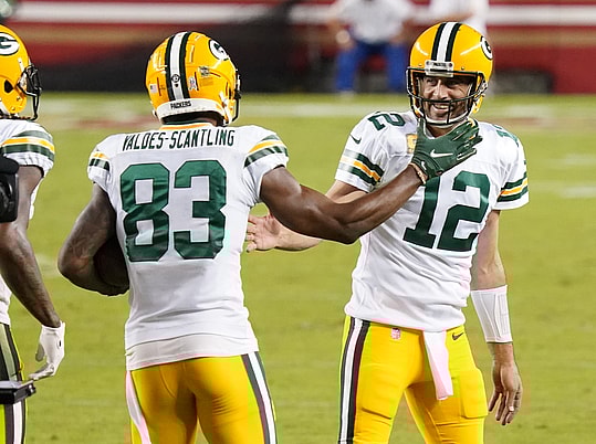 Nov 5, 2020; Santa Clara, California, USA; Green Bay Packers wide receiver Marquez Valdes-Scantling (83) celebrates with quarterback Aaron Rodgers (12) after catching a pass to score a touchdown against the San Francisco 49ers during the second quarter at Levi's Stadium. Mandatory Credit: Kyle Terada-USA TODAY Sports