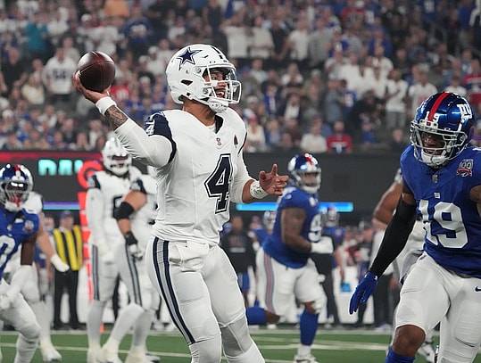 Sep 26, 2024; East Rutherford, New Jersey, USA;  Dallas Cowboys quarterback Dak Prescott (4) throws against the New York Giants in the first quarter at MetLife Stadium. Mandatory Credit: Robert Deutsch-Imagn Images