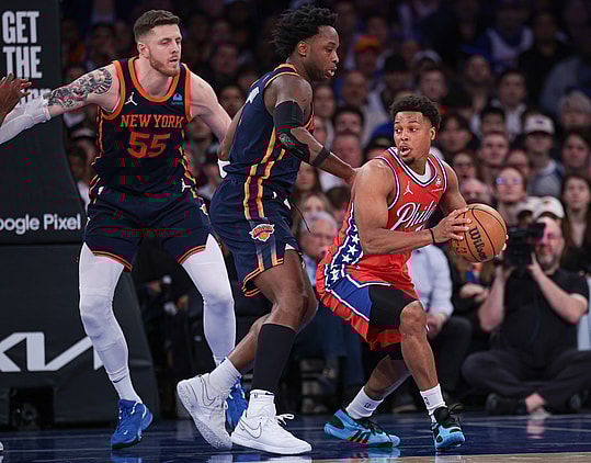 Apr 22, 2024; New York, New York, USA;  Philadelphia 76ers guard Kyle Lowry (7) is guarded by New York Knicks forward OG Anunoby (8) and center Isaiah Hartenstein (55) during the second half during game two of the first round for the 2024 NBA playoffs at Madison Square Garden. Mandatory Credit: Vincent Carchietta-USA TODAY Sports