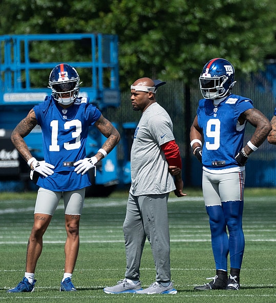 Steve Smith, center, is a two-time former All-Pro NFL wide receiver assisting with the NY Giants this spring. Here he works with Jalin Hyatt (13) and rookie Malik Nabers (9) in East Rutherford, NJ on Thursday May 30, 2024.