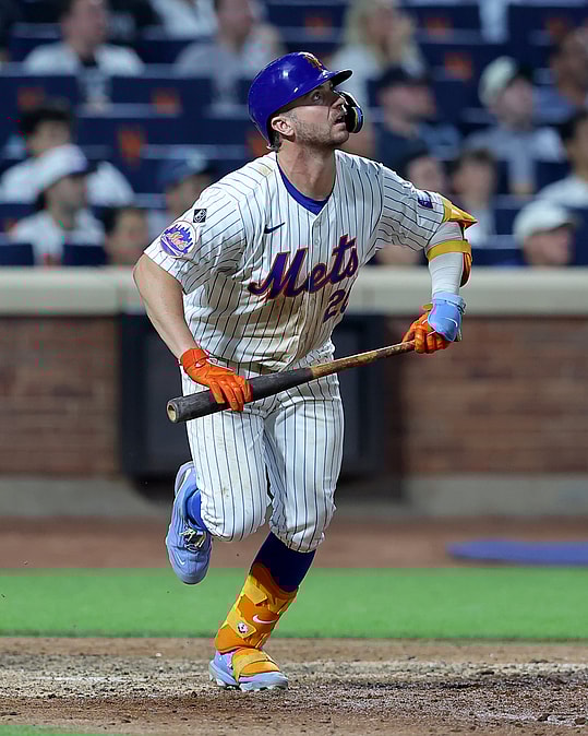 Jun 25, 2024; New York City, New York, USA; New York Mets first baseman Pete Alonso (20) watches his RBI sacrifice fly during the sixth inning against the New York Yankees at Citi Field. Mandatory Credit: Brad Penner-USA TODAY Sports