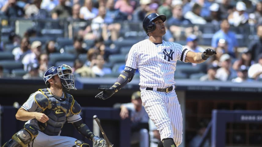 New York Yankees outfielder Aaron Hicks hits a home-run against the Tampa Bay Rays.