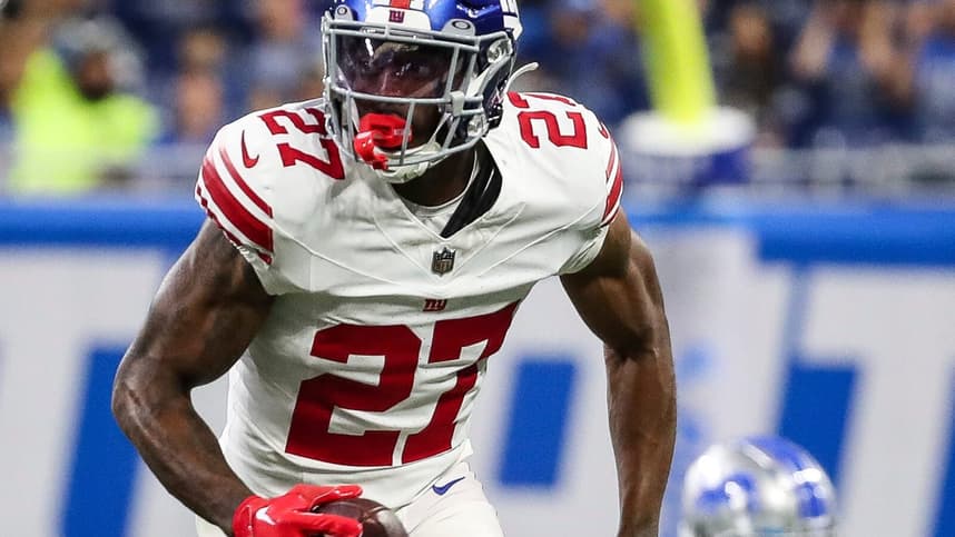 New York Giants safety Jason Pinnock (27) intercepts a pass from Detroit Lions quarterback Nate Sudfeld (10) during the first half of a preseason game in Detroit on Friday, Aug. 11, 2023.
