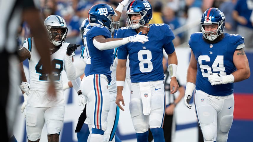 The Carolina Panthers vs. the New York Giants in an NFL preseason game at MetLife Stadium. New York Giants quarterback Daniel Jones (8) celebrates after throwing a pass for a touchdown in the first quarter