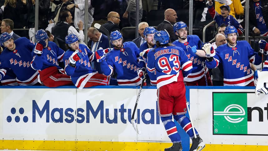 New York Rangers center Mika Zibanejad (93) celebrates with teammates after scoring a goal against the New Jersey Devils during the second period in game six of the first round of the 2023 Stanley Cup Playoffs at Madison Square Garden