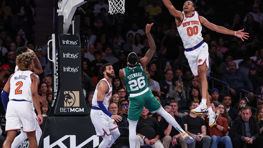 New York Knicks forward Jacob Toppin (00) blocks a shot by Boston Celtics guard DJ Steward (26) during the second half at Madison Square Garden