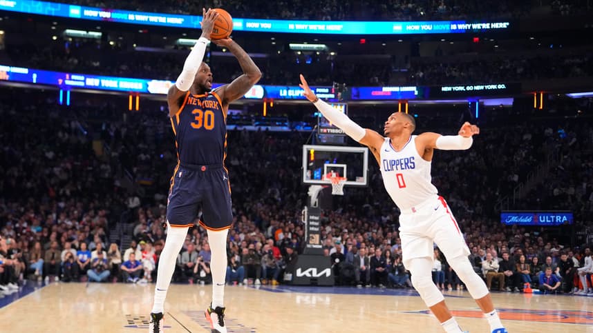New York Knicks power forward Julius Randle (30) shoots a three point jump shot against Los Angeles Clipper point guard Russell Westbrook (0) during the first quarter at Madison Square Garden