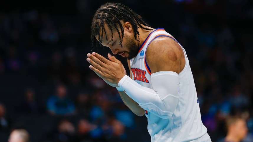 New York Knicks guard Jalen Brunson (11) pauses for a moment before the start of the game against the Charlotte Hornets at Spectrum Center
