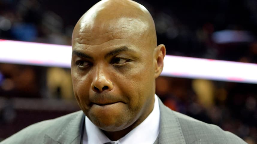 Former NBA player and current television personality Charles Barkley walks off the court after watching the New York Knicks defeat the Cleveland Cavaliers 95-90 at Quicken Loans Arena