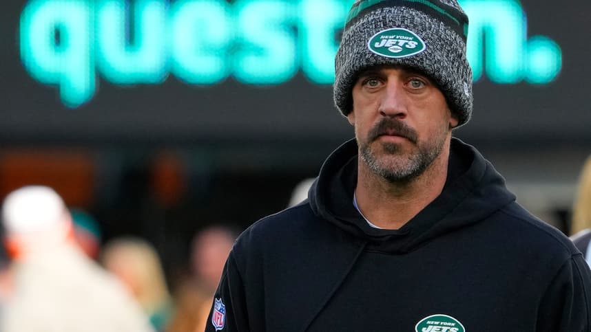 New York Jets quarterback Aaron Rodgers (8), on injured reserve, pregame against the Miami Dolphins at MetLife Stadium