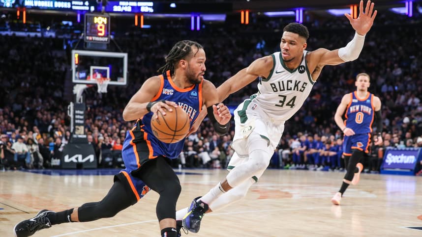 New York Knicks guard Jalen Brunson (11) looks to drive past Milwaukee Bucks forward Giannis Antetokounmpo (34) in the second quarter at Madison Square Gar
