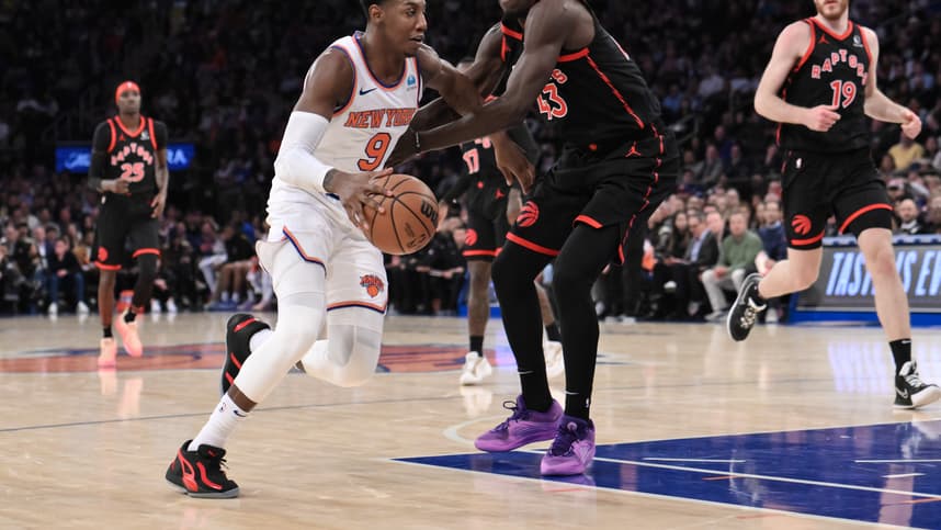 New York Knicks guard RJ Barrett (9) drives to the basket as Toronto Raptors forward Pascal Siakam (43) defends during the second quarter at Madison Square Garden