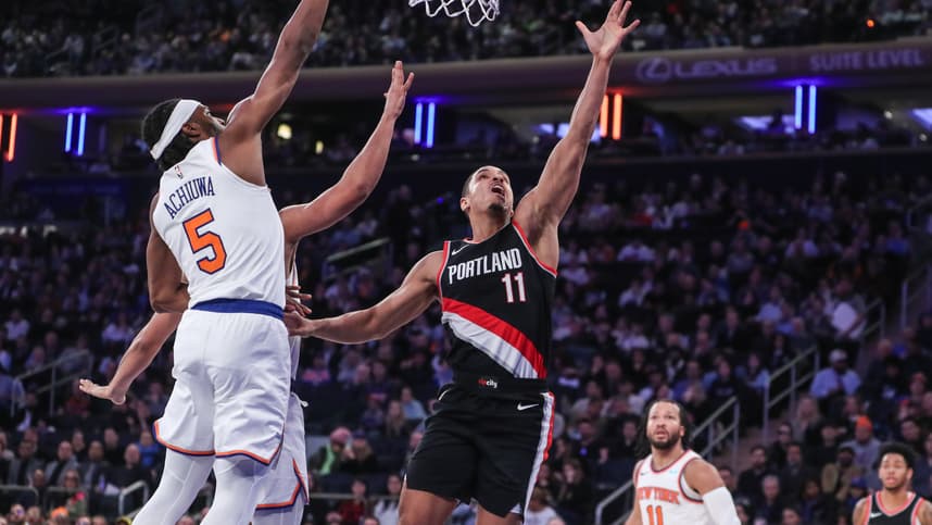 Portland Trail Blazers guard Malcolm Brogdon (11) drives past New York Knicks forward Precious Achiuwa (5) for layup in the second quarter at Madison Square Garden