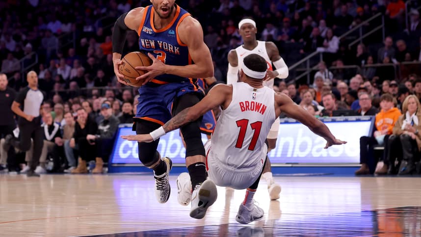 New York Knicks guard Josh Hart (3) is fouled as he drives to the basket by Toronto Raptors forward Bruce Brown (11) during the second quarter at Madison Square Garden