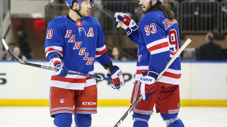 New York Rangers left wing Artemi Panarin (10) and center Mika Zibanejad (93) talk at the start of the game against the Vancouver Canucks at Madison Square Garden